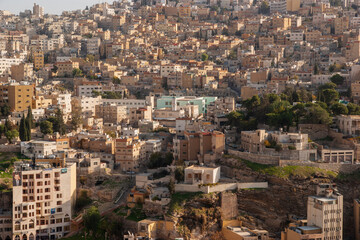 Jordan. Ancient Philadelphia or Amman Capital of Jordan. Citadel of Amman. View of city from height of hill on which citadel is located, City on hills, Car traffic. Amman, Jordan, December 2, 2009