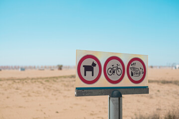 Prohibiting signs prohibited dog,bicycle and loud music sign on access beach sea coast