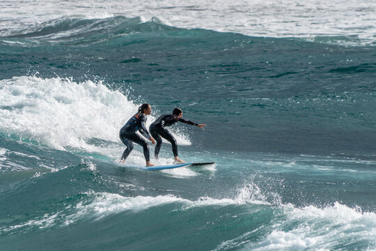 surfing on the beach of la cicer in Las Plamas de GRan Canaria