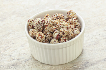 Sweet peanut in sesame seeds