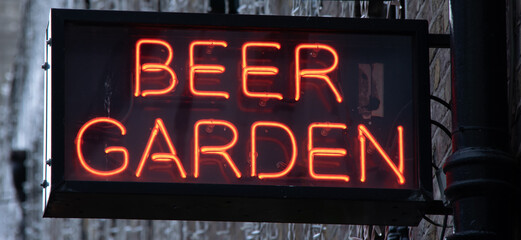 red neon beer garden sign