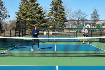 A Player Prepares to Return a Serve in Pickleball