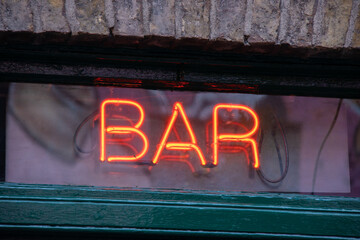 Fototapeta premium neon bar sign in public house window