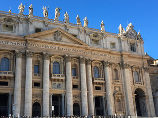 Fototapeta na wymiar Close-up on cathedral against the blue sky. Vatican.