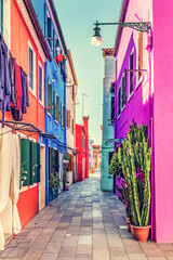 Fototapeta na wymiar Colorful painted houses on Burano island near Venice, Italy