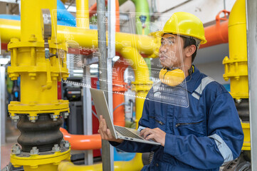 Maintenance technician at a heating plant,Petrochemical workers supervise the operation of gas and oil pipelines in the factory,Engineers put hearing protector At room with many pipes