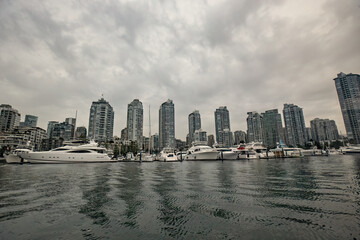 Obraz premium Granville island marina and residential buildings in Vancouver downtown Canada
