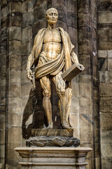 Statue of St. Bartholomew in Milan cathedral, Italy