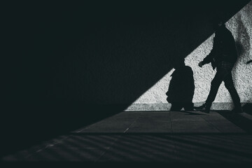 silhouette of a man in the underground passage