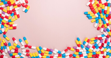Medicine pills, tablets, capsules frame over beige background. Copy space. Pharmacy industry concept.