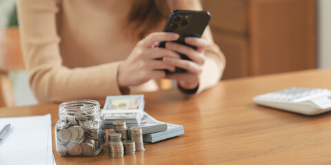 Woman with coin stack. Financial Growing savings concept. Saving money by hand putting coins money accounting planning.