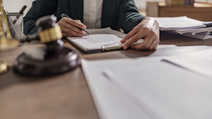 lawyer or judge counselor reading  legal contract documents in office.