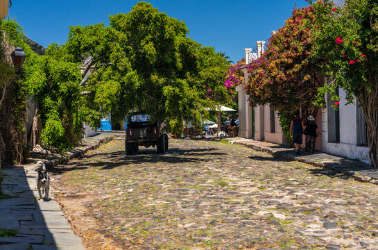 Small Cobblestone Street Leading To Restaurant In Colonia Del Sacramento Uruguay