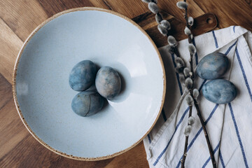 Stylish spring Easter eggs in a minimalist style. Trend colors and backgrounds for Easter 2023.