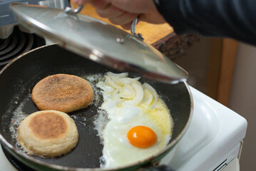 chef preparing food in a pan