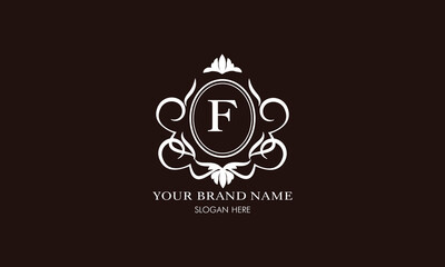Vector illustration of letter F logo template. Classic floral monogram with decorative elements.