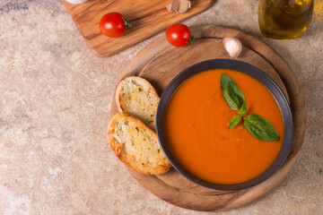 Tomato soup with basil.  Healthy, vegan and dieting lunch and dinner concept. Gazpacho. 