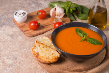 Tomato soup with basil.  Healthy, vegan and dieting lunch and dinner concept. Gazpacho. 