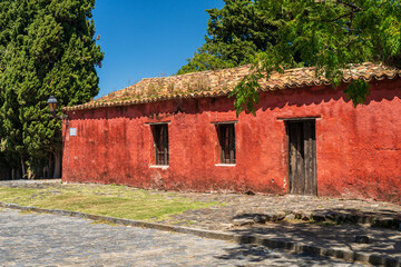 Old stone cottage painted red in Colonia del Sacramento Uruguay