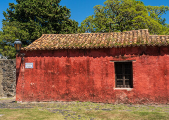 Fototapeta na wymiar Old stone cottage painted red in Colonia del Sacramento Uruguay