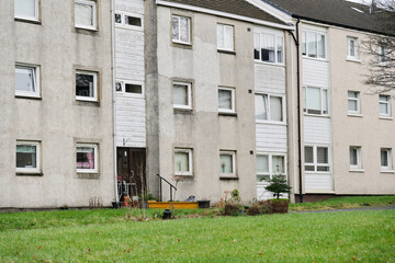 Fototapeta na wymiar High rise council flats in poor housing estate with many social welfare issues in Maryhill, Glasgow
