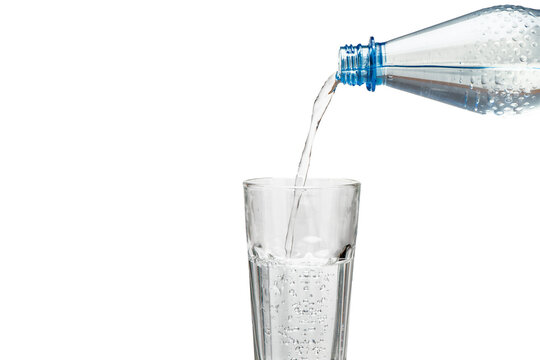isolated bottle with water and drinking glass over transparent background