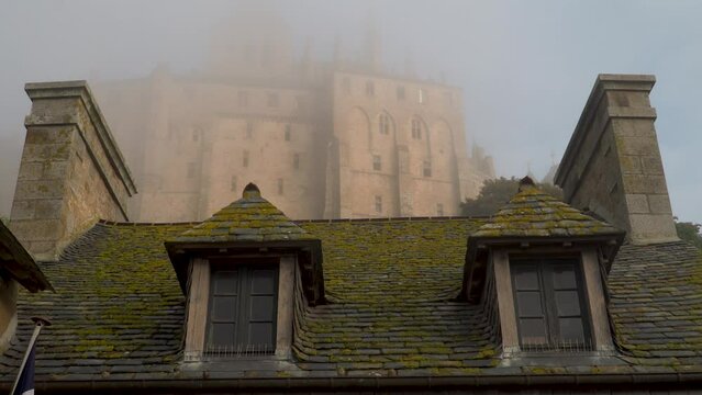 Foggy Morning at the famous Le Mont Saint-Michel tidal island , Normandy, France
