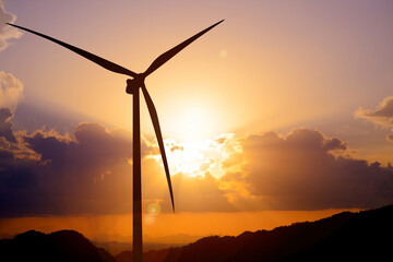Alternative energy concept. Wind energy. Windmills generate electricity in the evening.