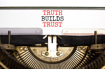Truth builds trust symbol. Concept words Truth builds trust typed on an old retro typewriter on a...