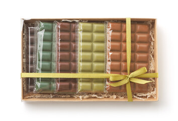Various chocolate bars set in paper box
