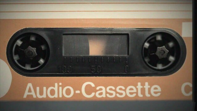 Retro music radio tape recorder, audio cassette playing close-up VHS. Listening to music, recording studio old radio boombox player, searching channel, volume. 