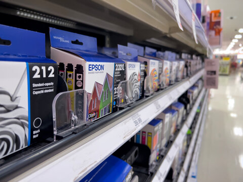Lynnwood, WA USA - circa February 2023: Selective focus on Epson printer ink for sale inside a Target retail store.