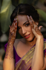 Bride. Beautiful young caucasian woman in traditional indian clothing with bridal makeup and...