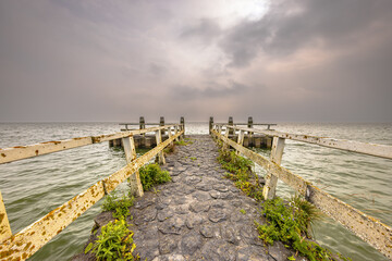 Obraz premium Pier in water of lake IJsselmeer