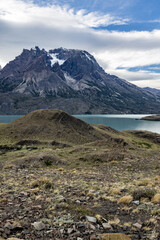 Impressive mountains and a lake with turquoise water at Torres del Paine National Park in Chile, Patagonia, South America