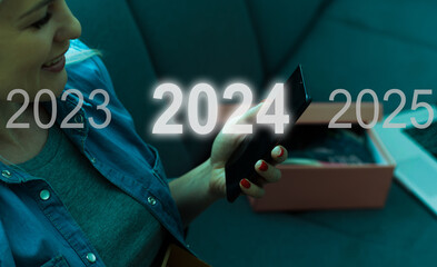 A man touching on virtual screen 2024. Business new year concept, welcome to year 2024 concept.