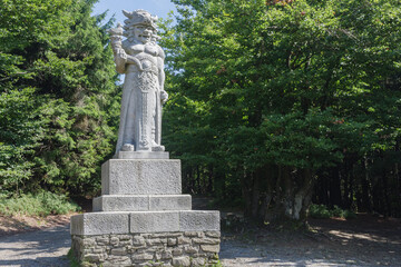 Statue of pagan god Radegast in summer day on Radhost, Beskid mountains, Czceh Republic.