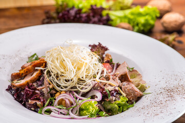 Salad with meat and cheese