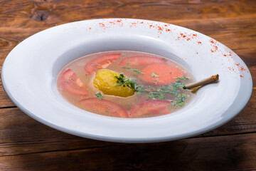 Broth with vegetables and meat