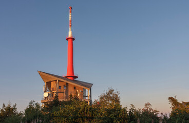 Television transmitter on Lysa Hora, beskid mountains, Czech republic at summer sunset time.