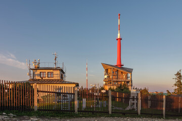Meteorologist station and television transmitter on Lysa Hora, beskid mountains, Czech republic at summer sunset time.