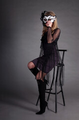 Mysterious Girl in a masquerade mask, party