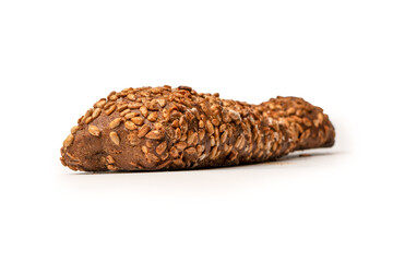 Loaf of bread with sunflower seeds isolated on a white background.