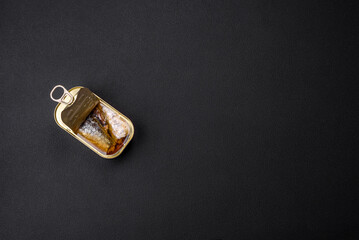 Metal aluminum can of canned sardines in oil with spices and salt