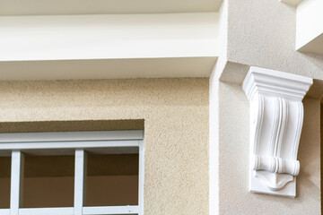 Ceiling moldings with an intricate crown in the inner corner. Home renovation, home decoration,...