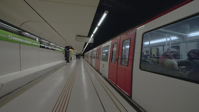Metro train leaving the platform in Barcelona metro
