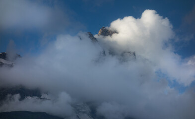 Naklejka na ściany i meble The Matterhorn peak seen from the Italian town of Breuil-Cervinia. Monte Cervino.