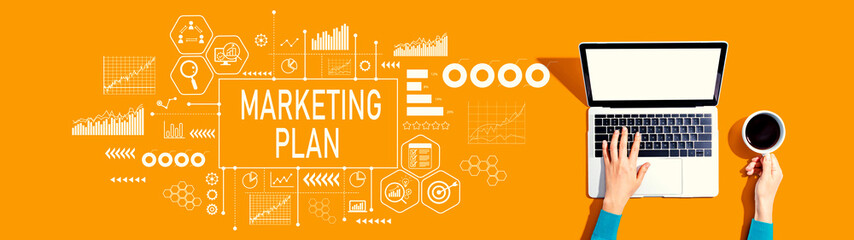 Fototapeta premium Marketing plan theme with person using a laptop computer
