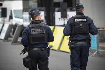 View of policemen walking in the street