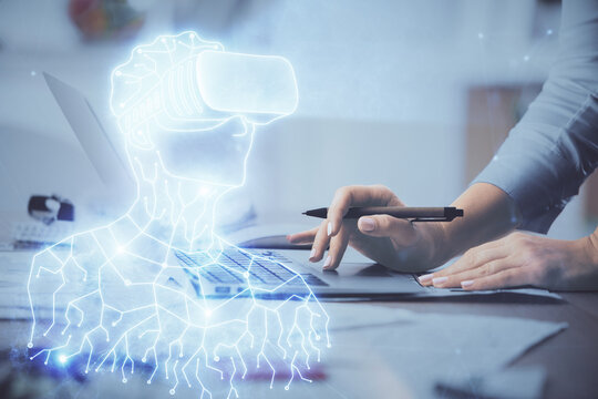 Double exposure of woman hands typing on computer and man in AR glasses drawing. Education concept. © peshkova